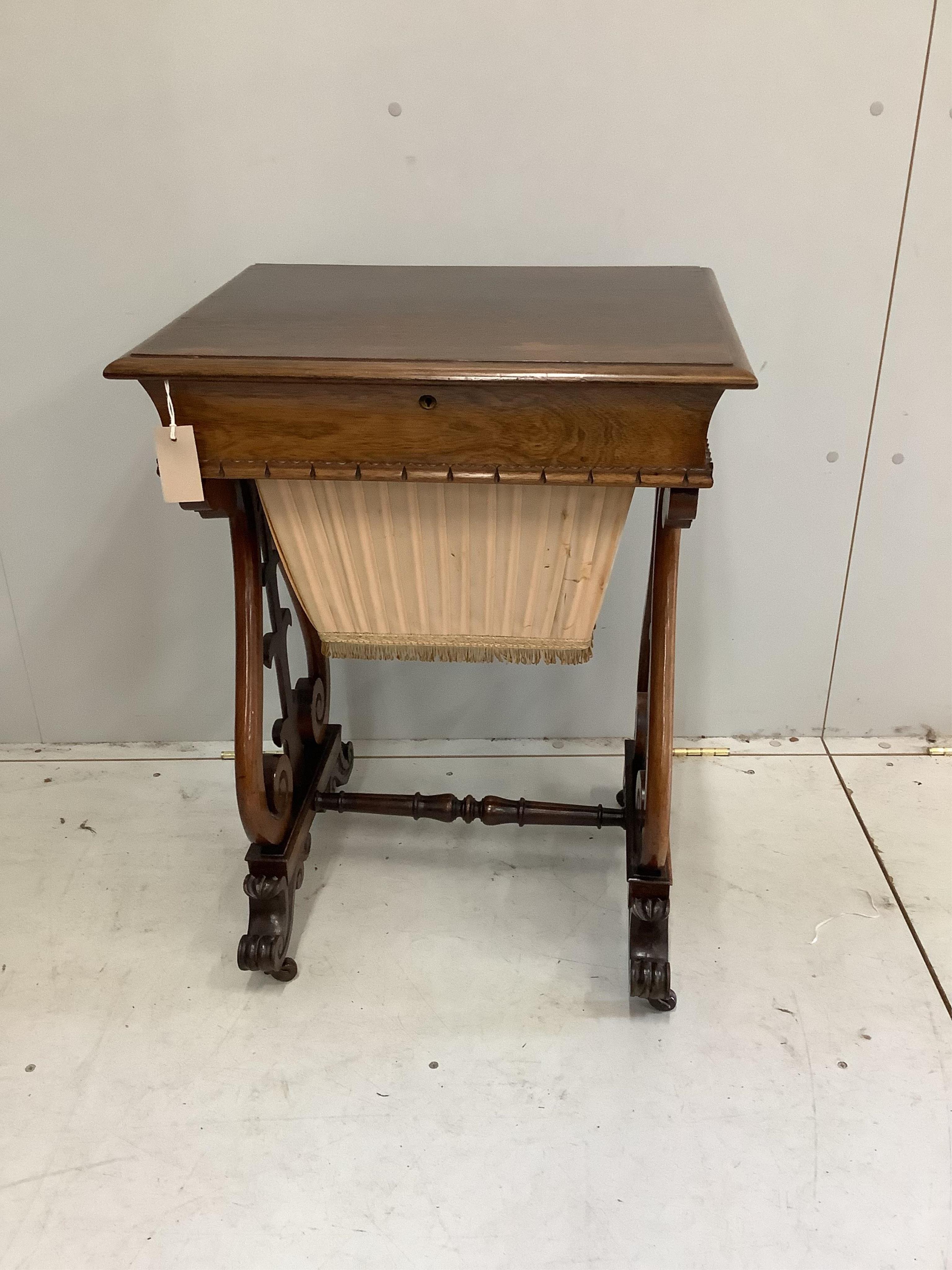 A Victorian rosewood work table, width 56cm. Condition - top faded, otherwise good